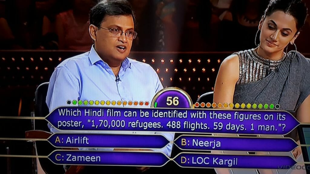 Ques : Which Hindi film can be identified with these figures on its posters, "1,70,000 refugees, 488 flights, 59 days, 1 man."?