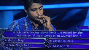 Which Indian hockey player holds the record for the most number of goals scored in an Olympic final