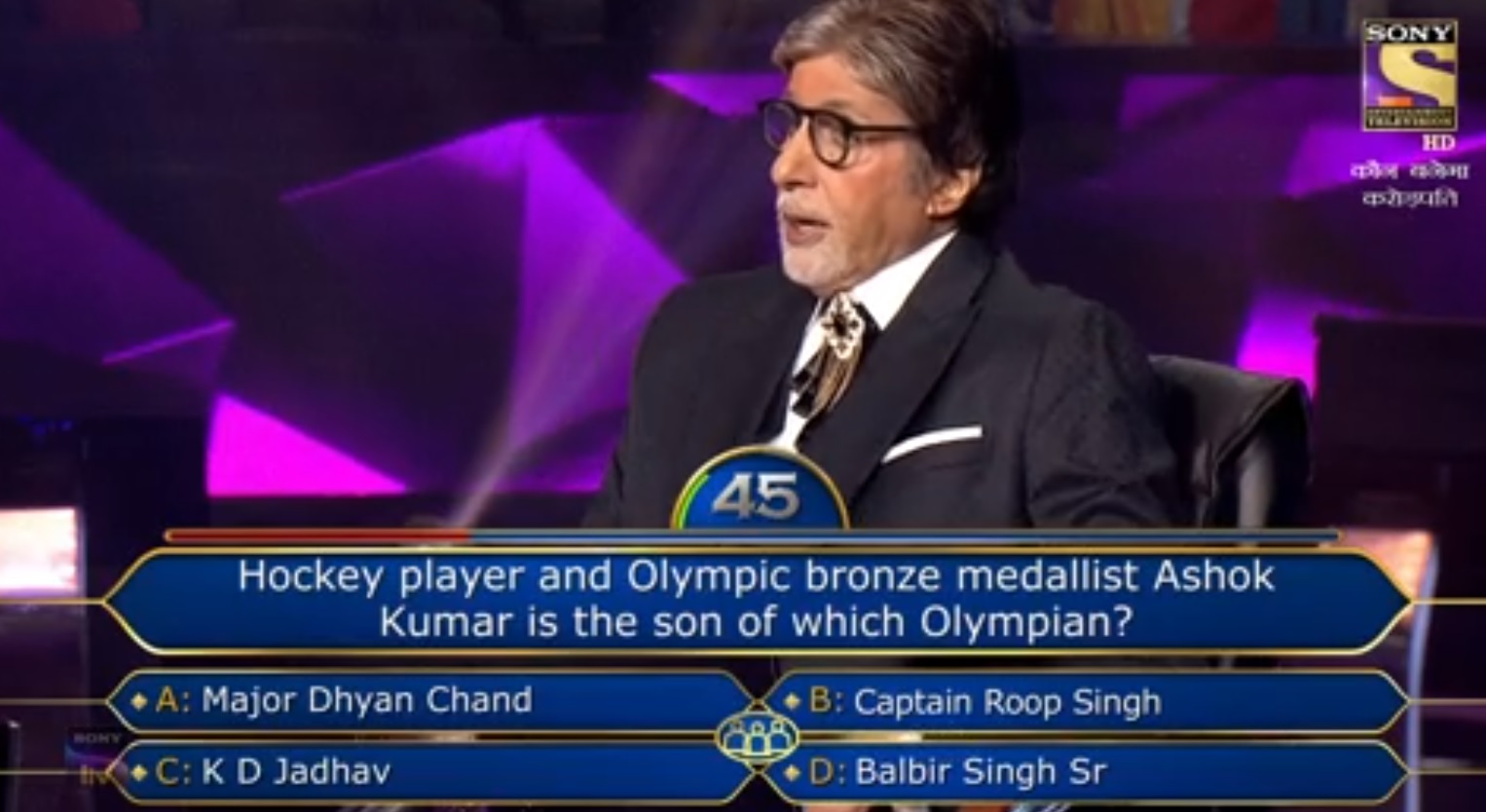 Ques : Hockey player and Olympic bronze medalist Ashok Kumar is the son of which Olympian?