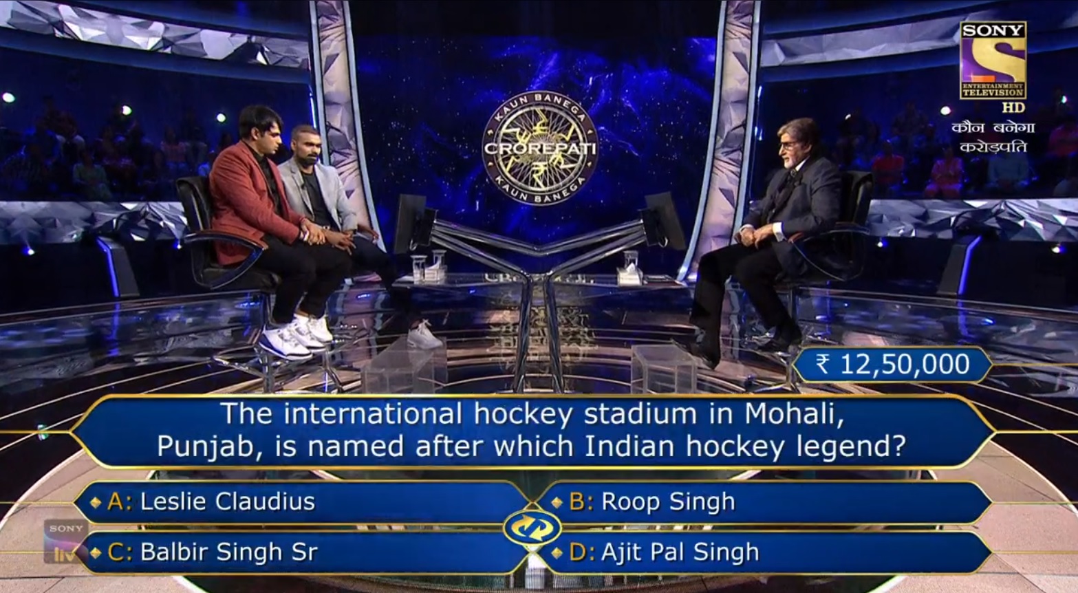 Ques : The international hockey stadium in Mohali, Punjab, is named after which Indian Hockey legend?