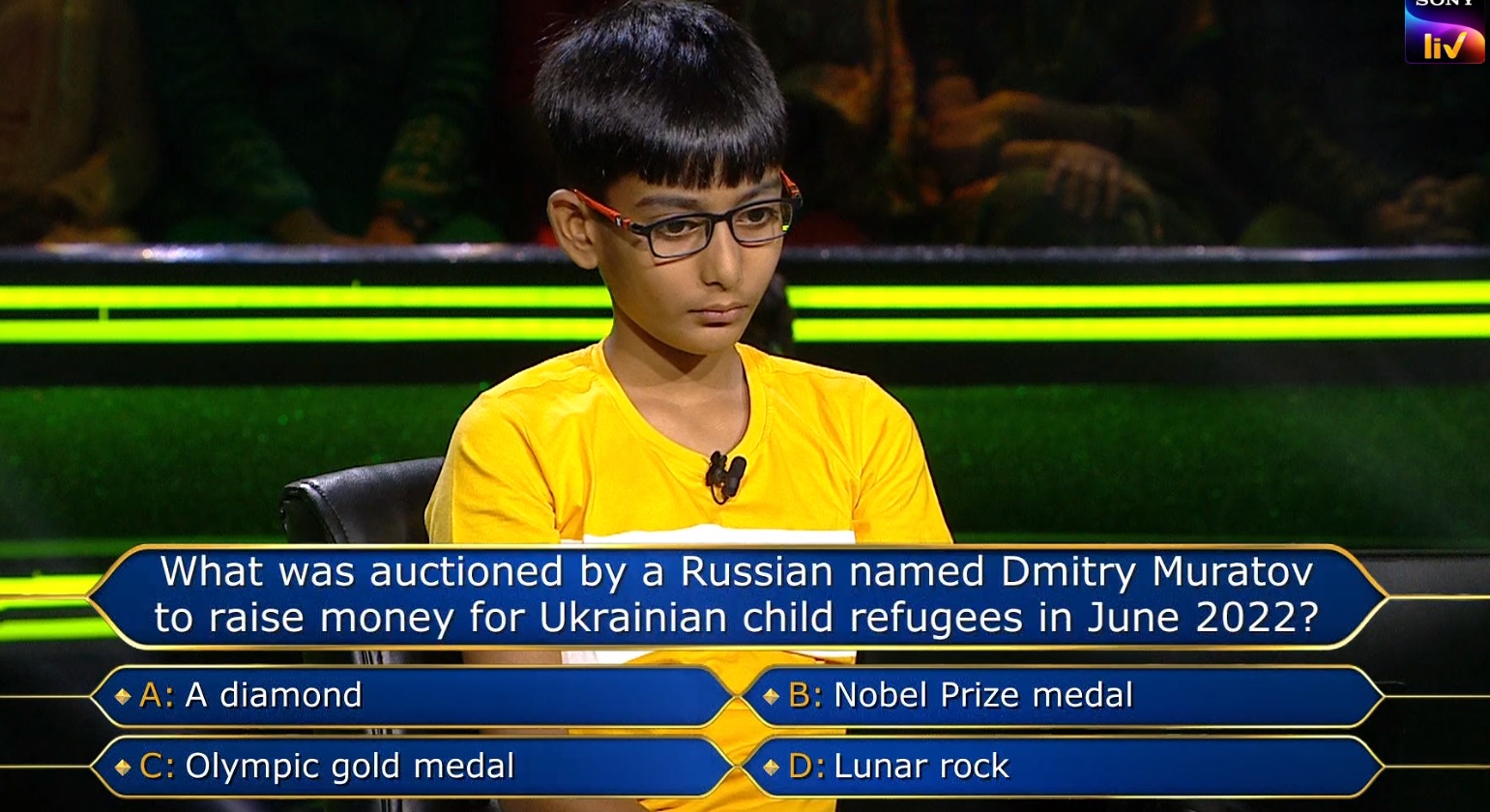 Ques : What was auctioned by a Russian named Dmitry Muratov to raise money for Ukrainian child refugees in June 2022?