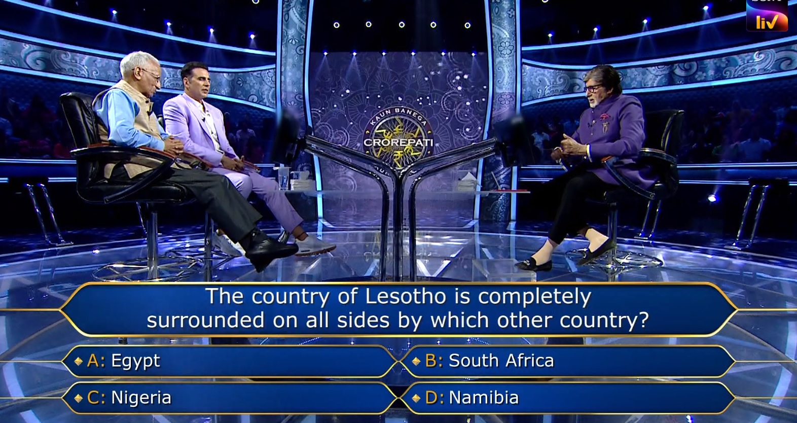 Ques : The country of Lesotho is completely surrounded on all sides by which other country?